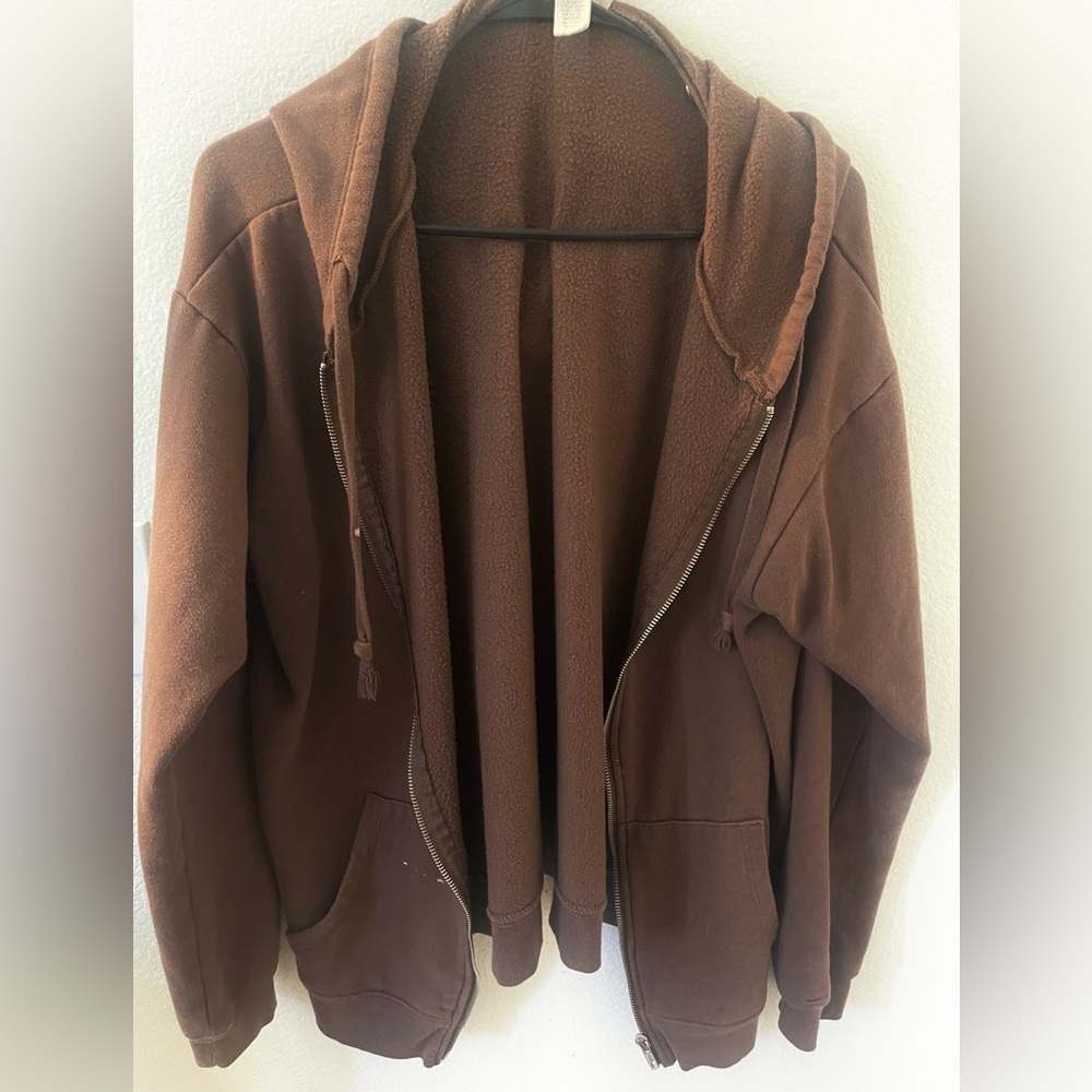 Tilly’s zip up sweater. Used but in good condition.